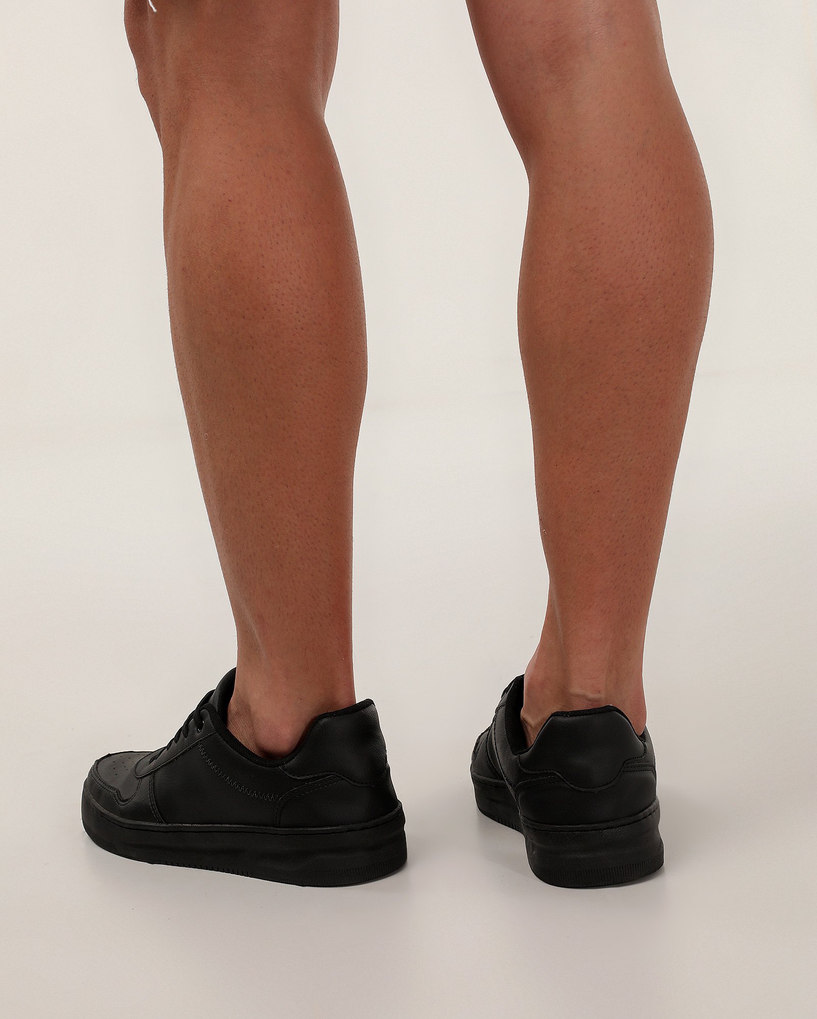 Tênis masculino com pespontos - Preto | Riachuelo