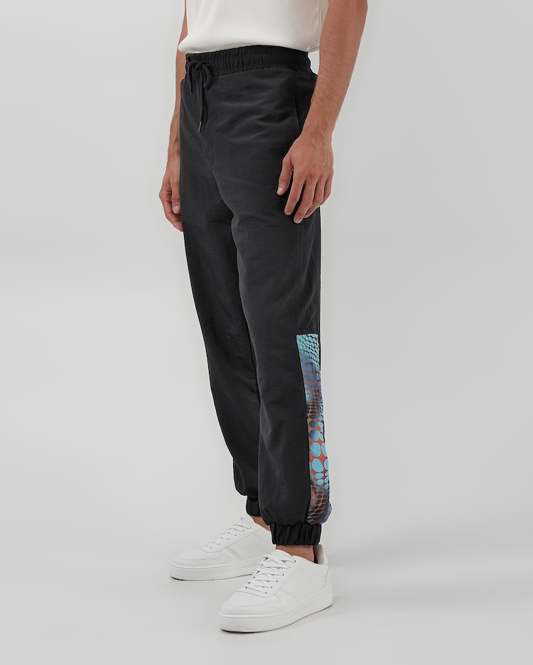 Riachuelo Calça jogger masculina estampada preta The Town para
