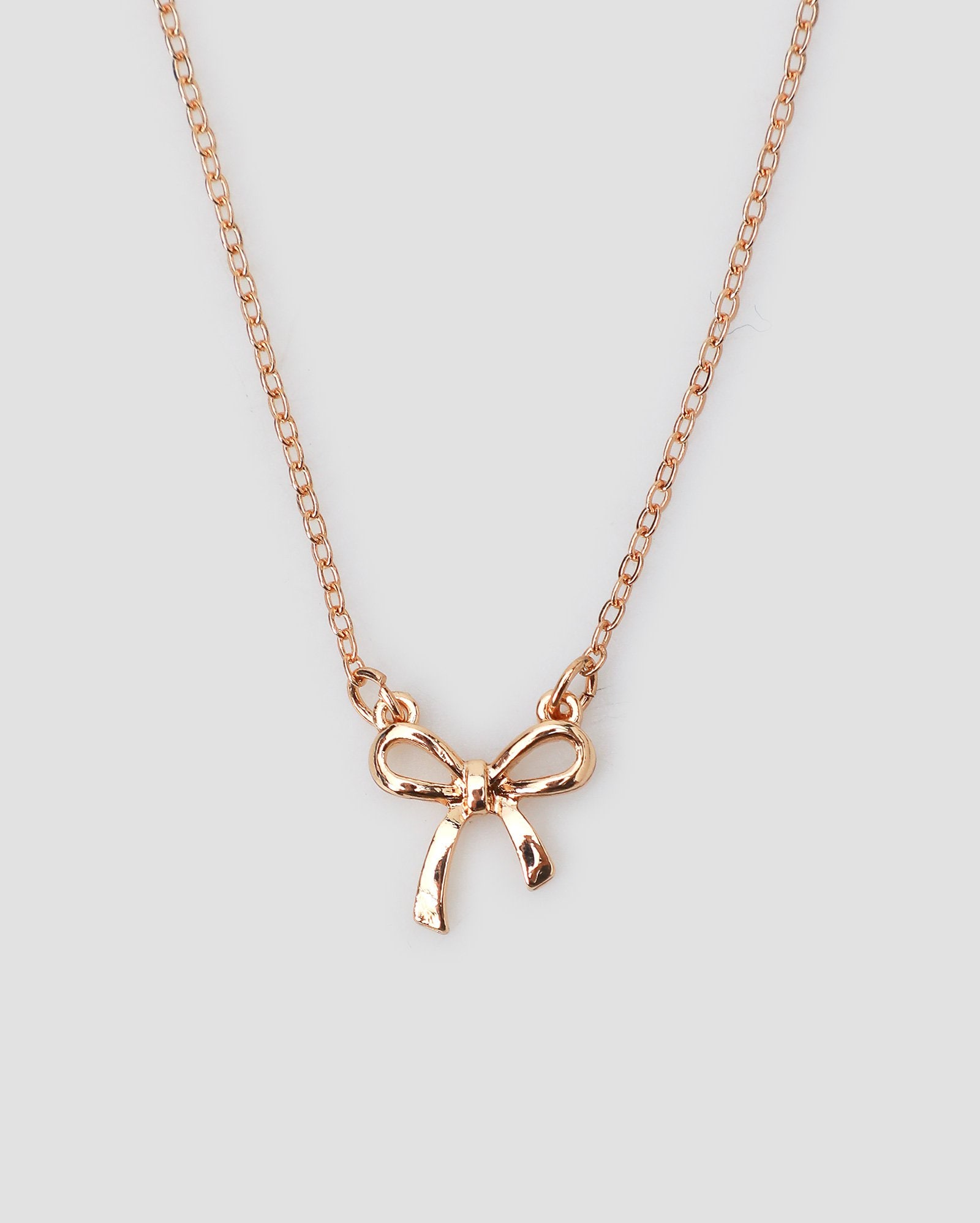 Colares Riachuelo Riachuelo | Colar feminino pingente laço dourado | Accessori by Riachuelo