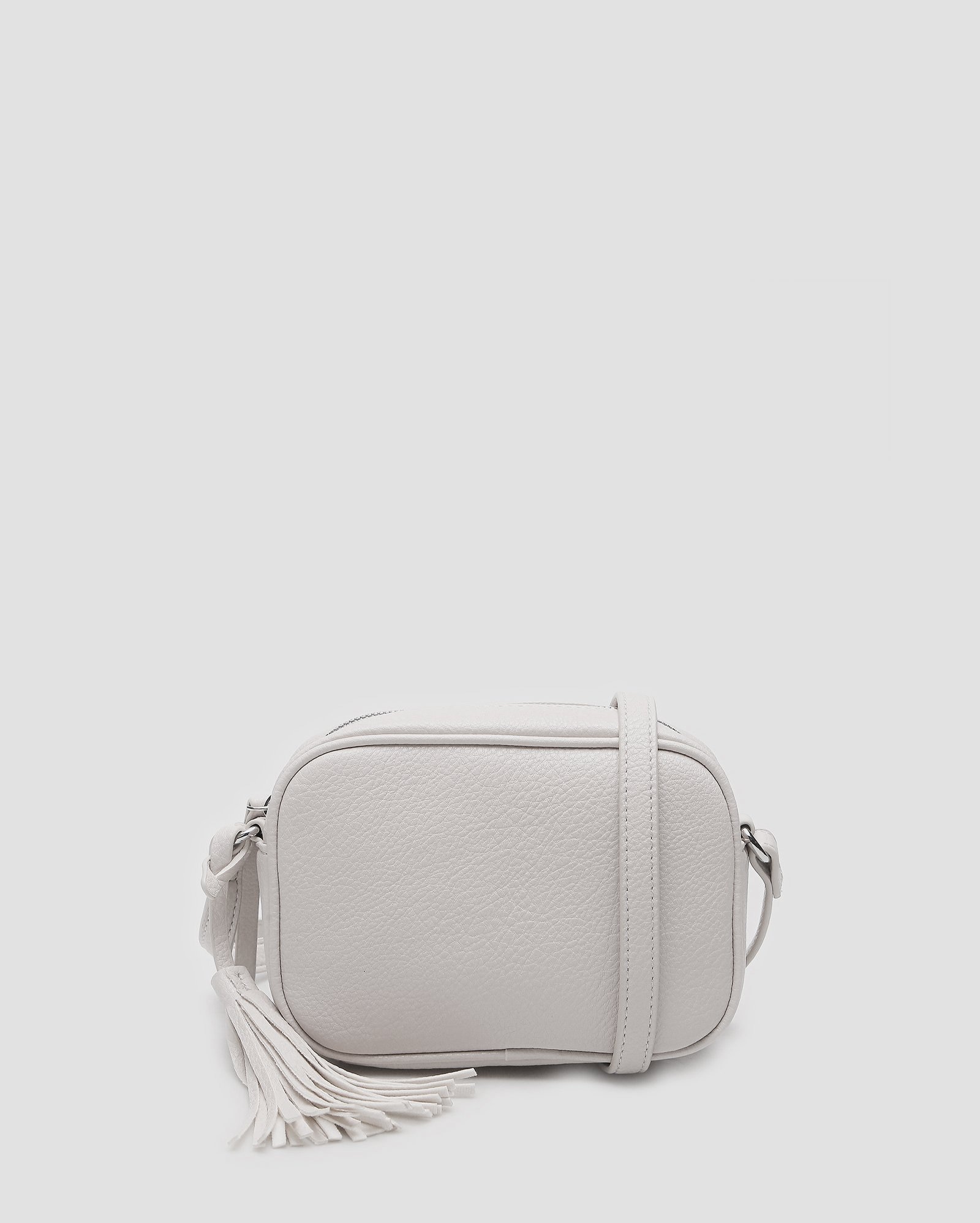 Bolsa transversal de poliuretano com tassel - Off-white | Accessori by Riachuelo