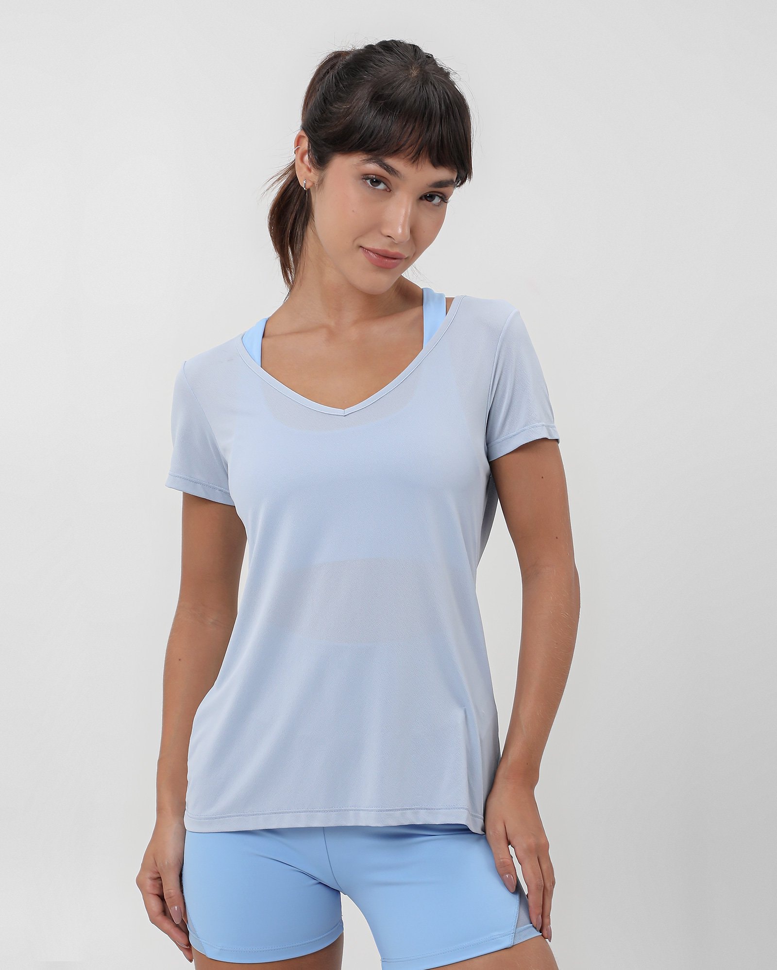 Camiseta esportiva feminina de poliamida respirável - Azul Claro | Body Work