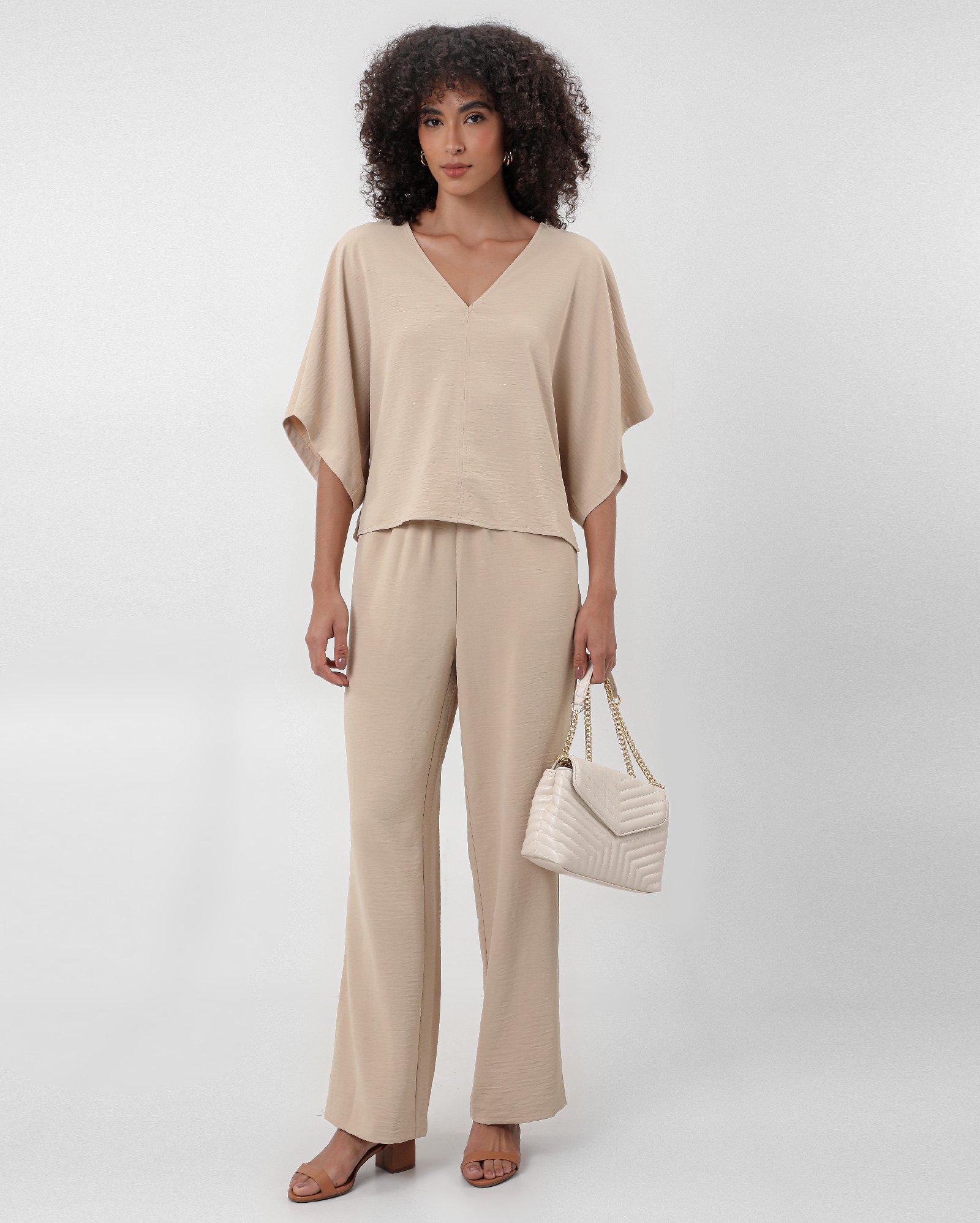 Calça feminina relaxed crepe texturizado - Bege