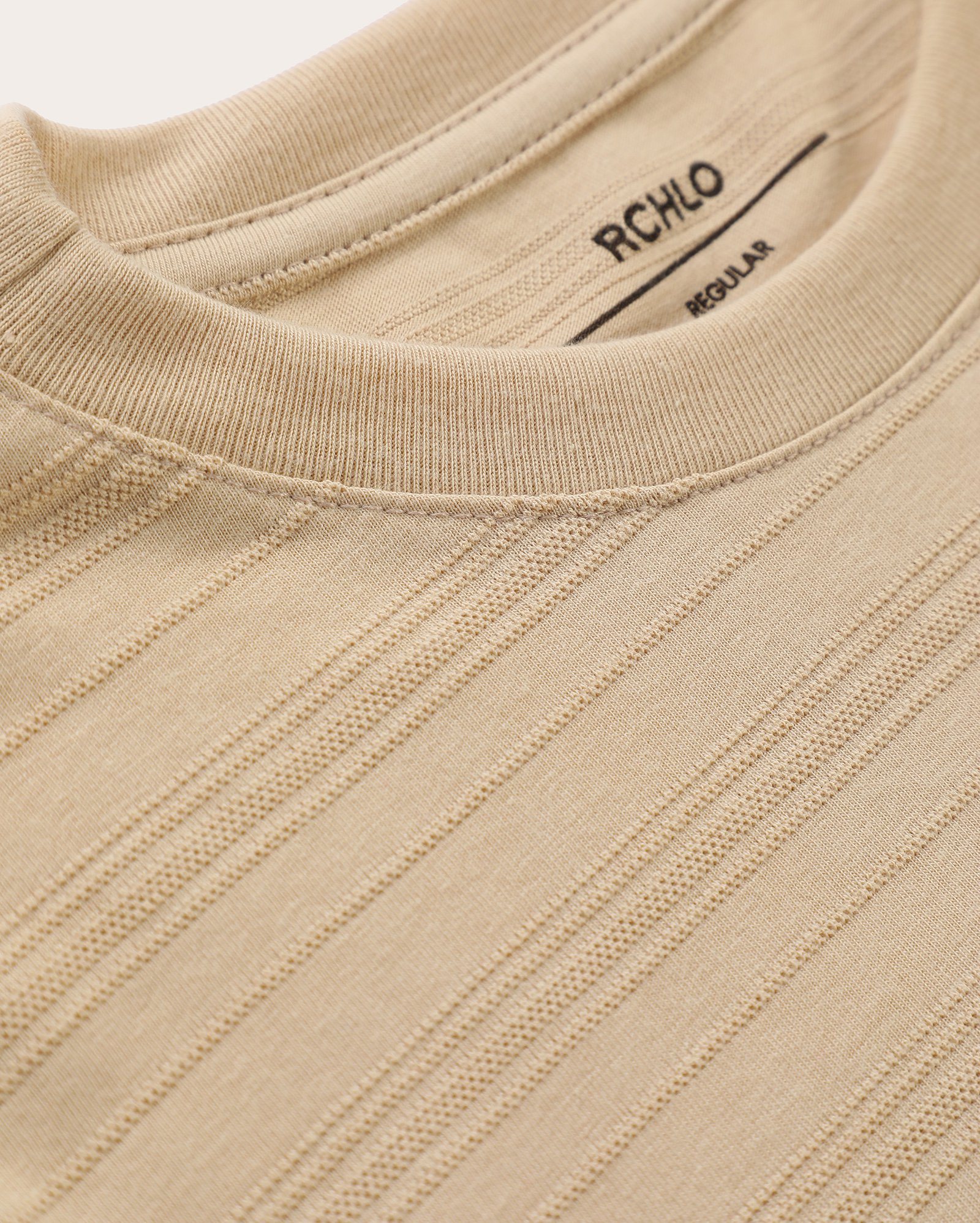 Camiseta básica juvenil texturizada com bolso - Bege