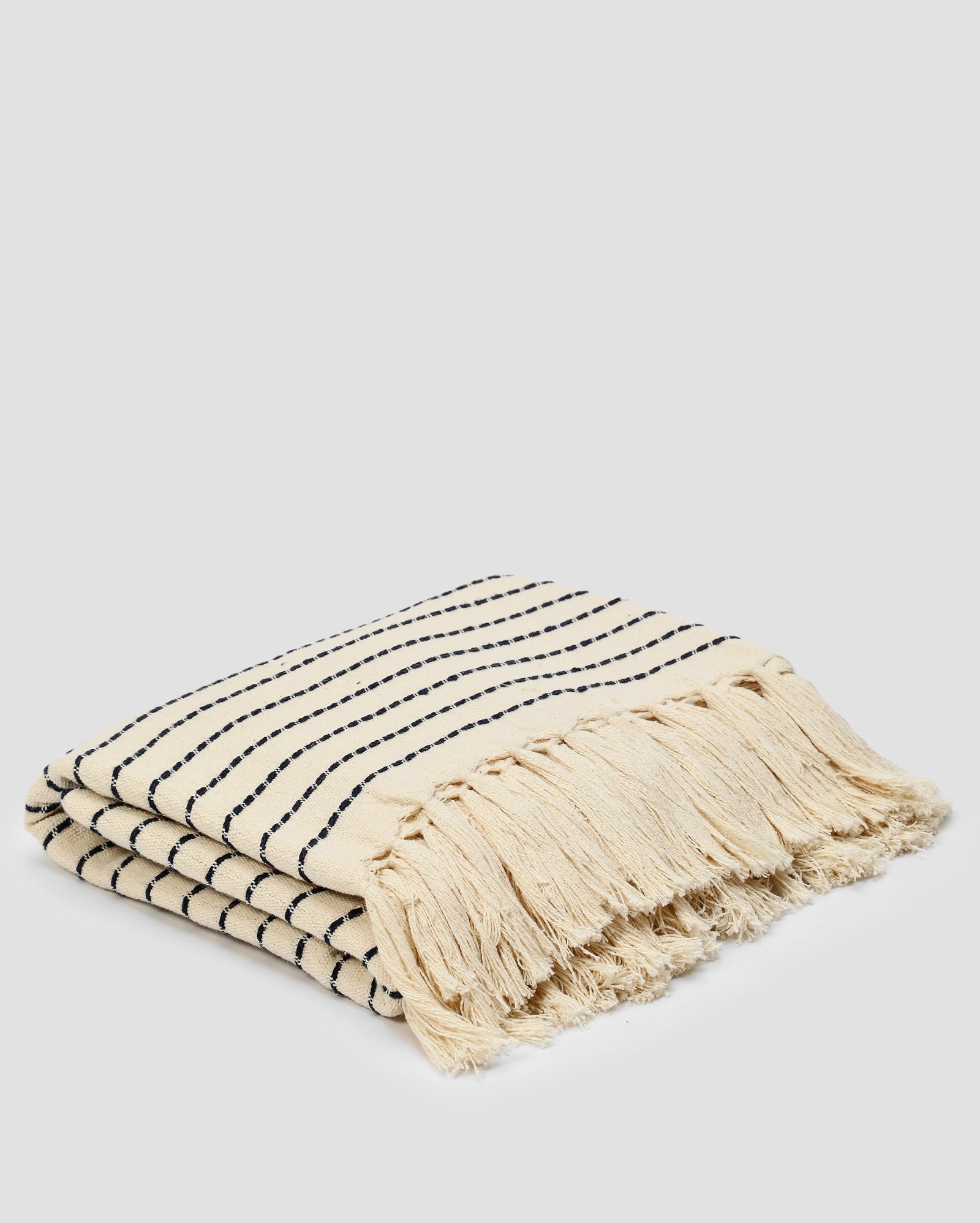 Manta decorativa para sofá pespontada 120x140cm bege | Casa Riachuelo