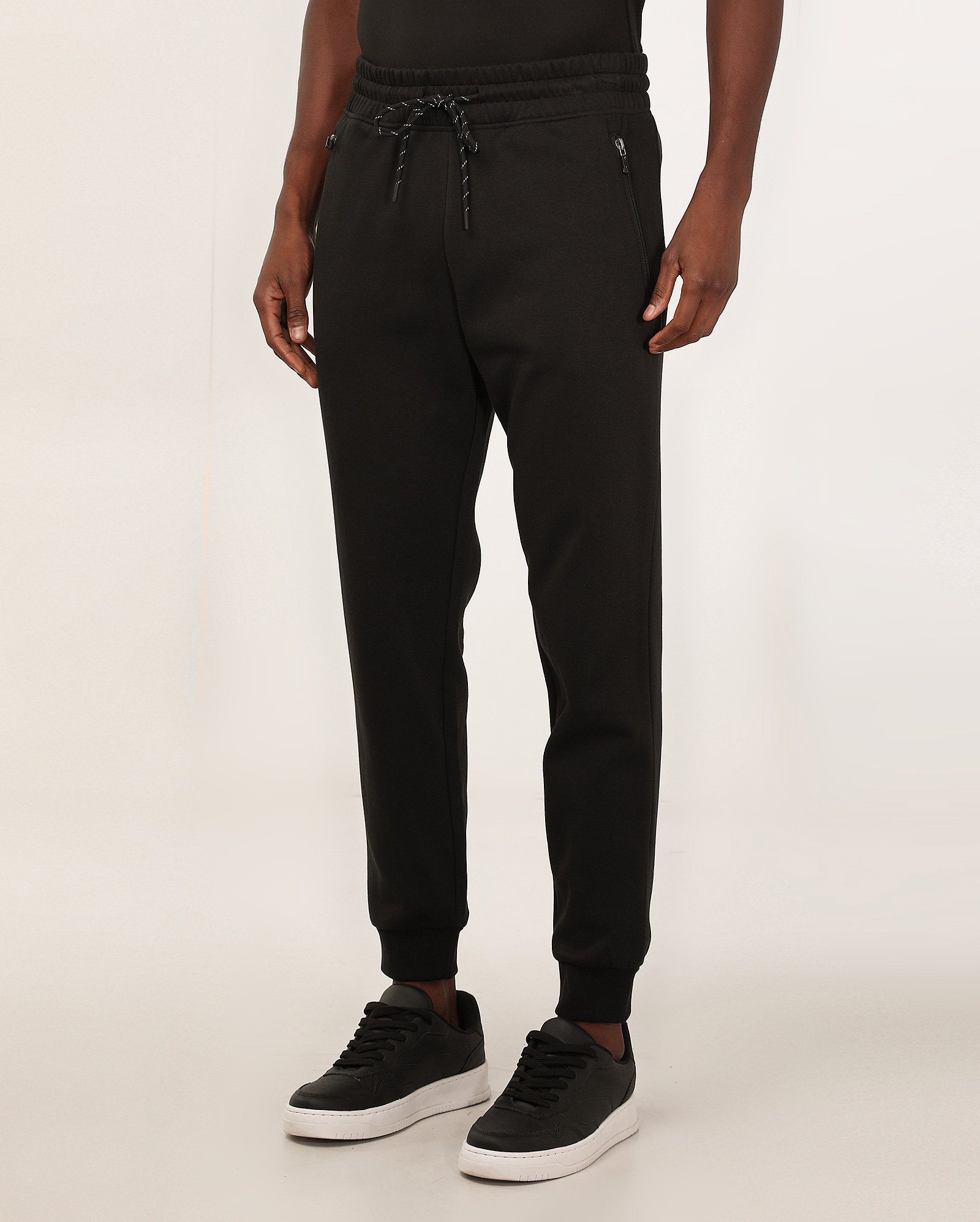 Calça de moletom esportiva masculina com com bolso zíper e felpa - Preto | BodyWork by Riachuelo