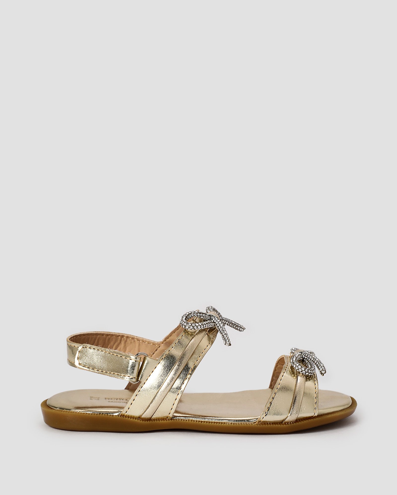 Sandália rasteira infantil com laço de strass - Dourado | Riachuelo