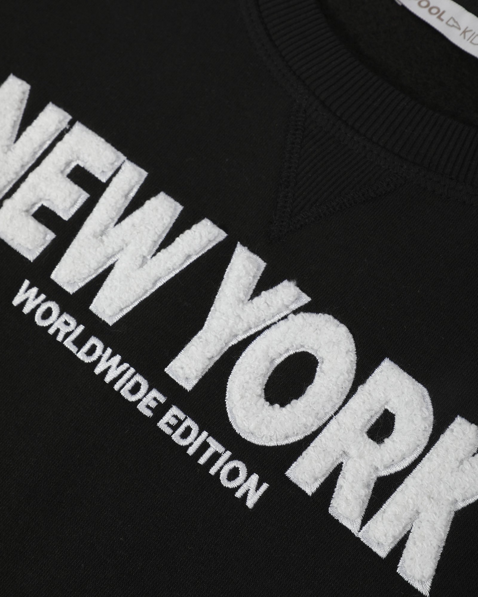 Blusa de moletom infantil alongada New York com felpa 4-10A preta | Pool Kids