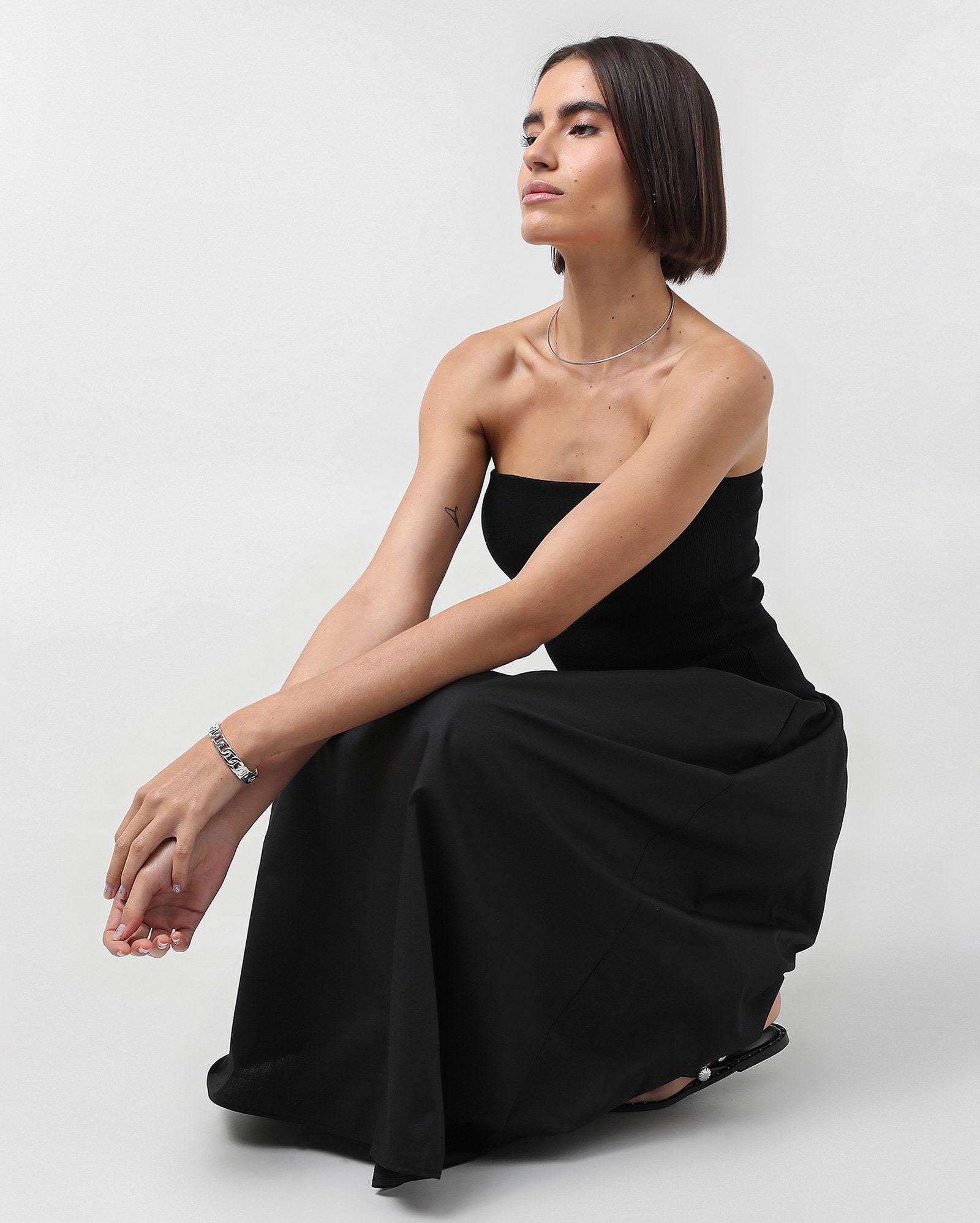 Vestido midi de ribana com cintura baixa e bolsos - Preto | AK by Riachuelo