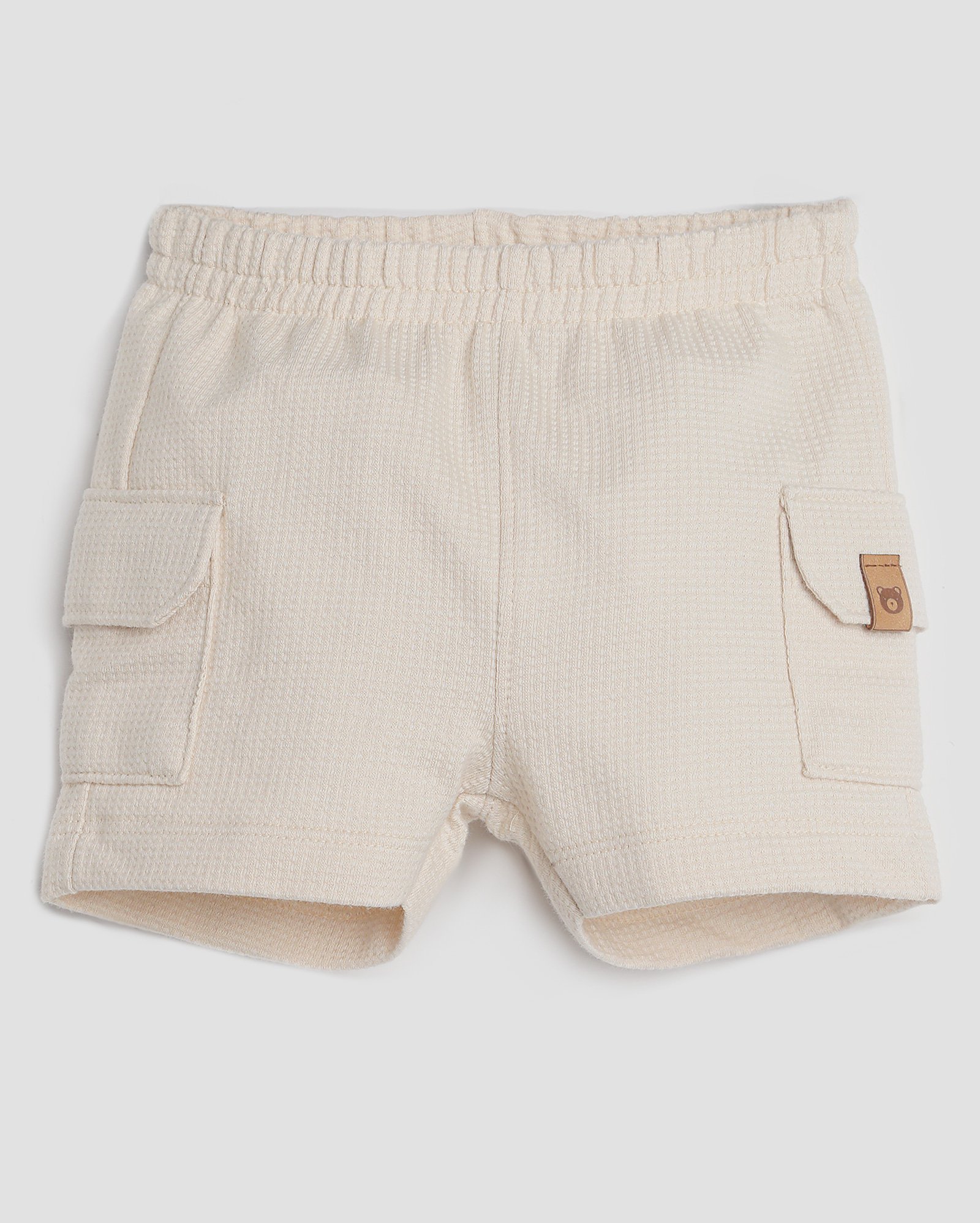 Short de algodão bebê texturizado com bolso lateral bege | Baby Way