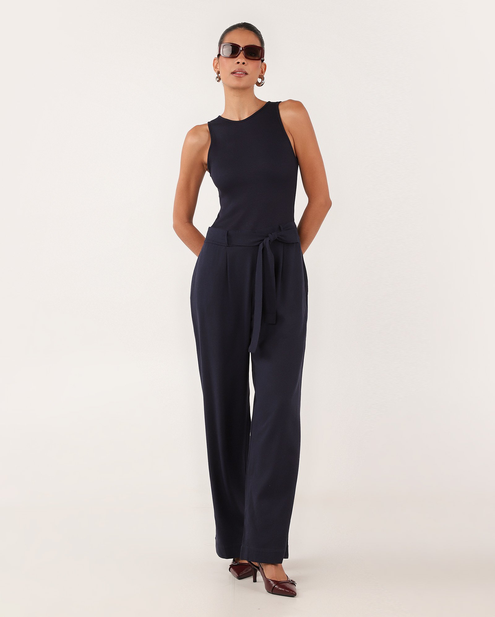 Macacão feminino canelado com laço frontal azul | AK by Riachuelo