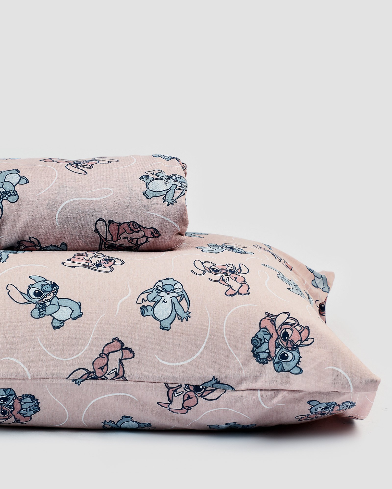 Jogo de cama solteiro 2 peças malha Stitch e Angel rosa | Casa Riachuelo