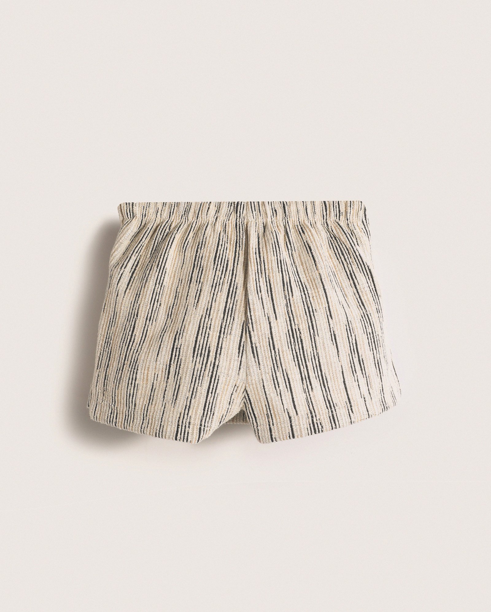 Short-saia infantojuvenil tweed com pregas 4-12A bege | Missinclof + Riachuelo
