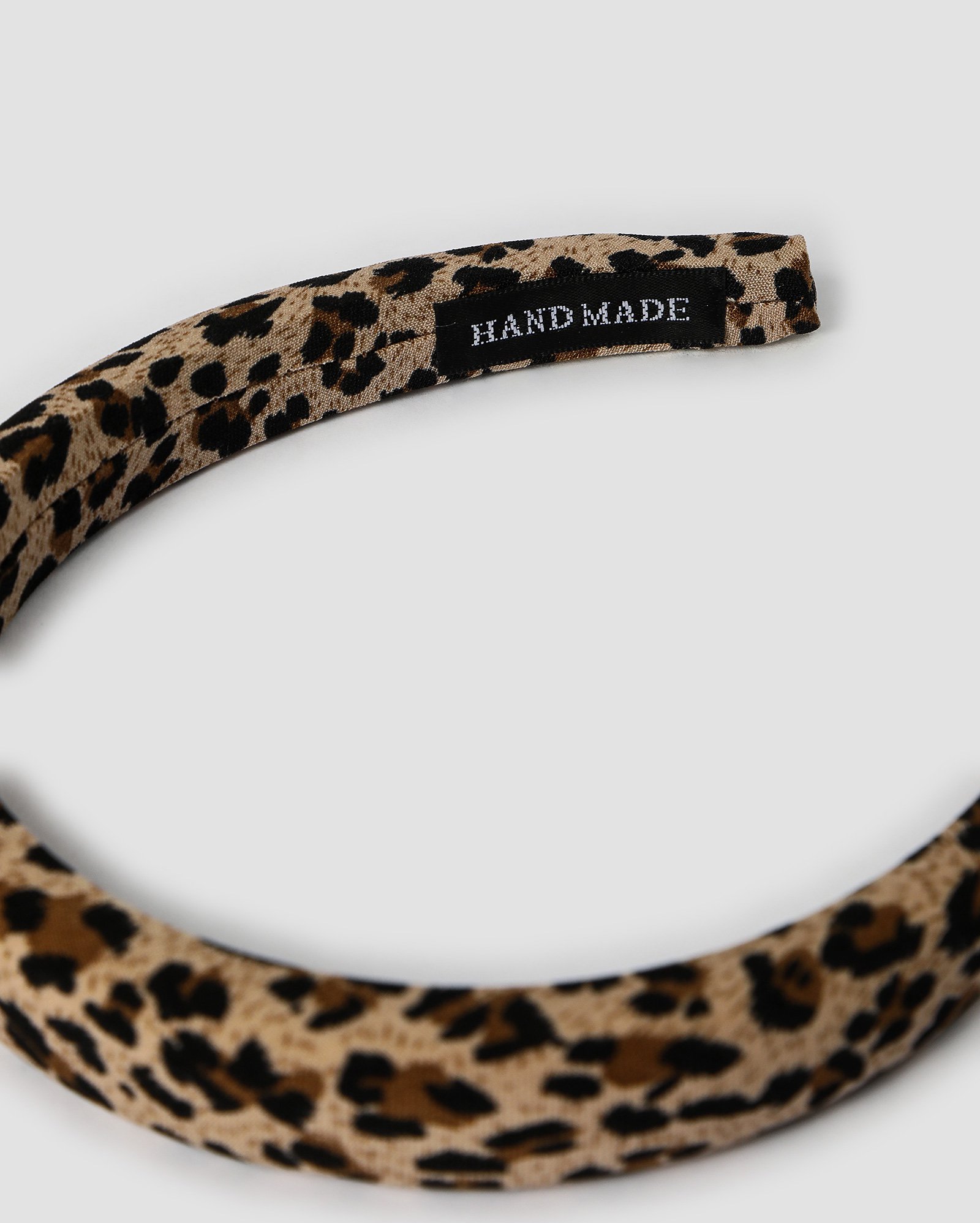 Tiara feminina onça bege | Accessori by Riachuelo