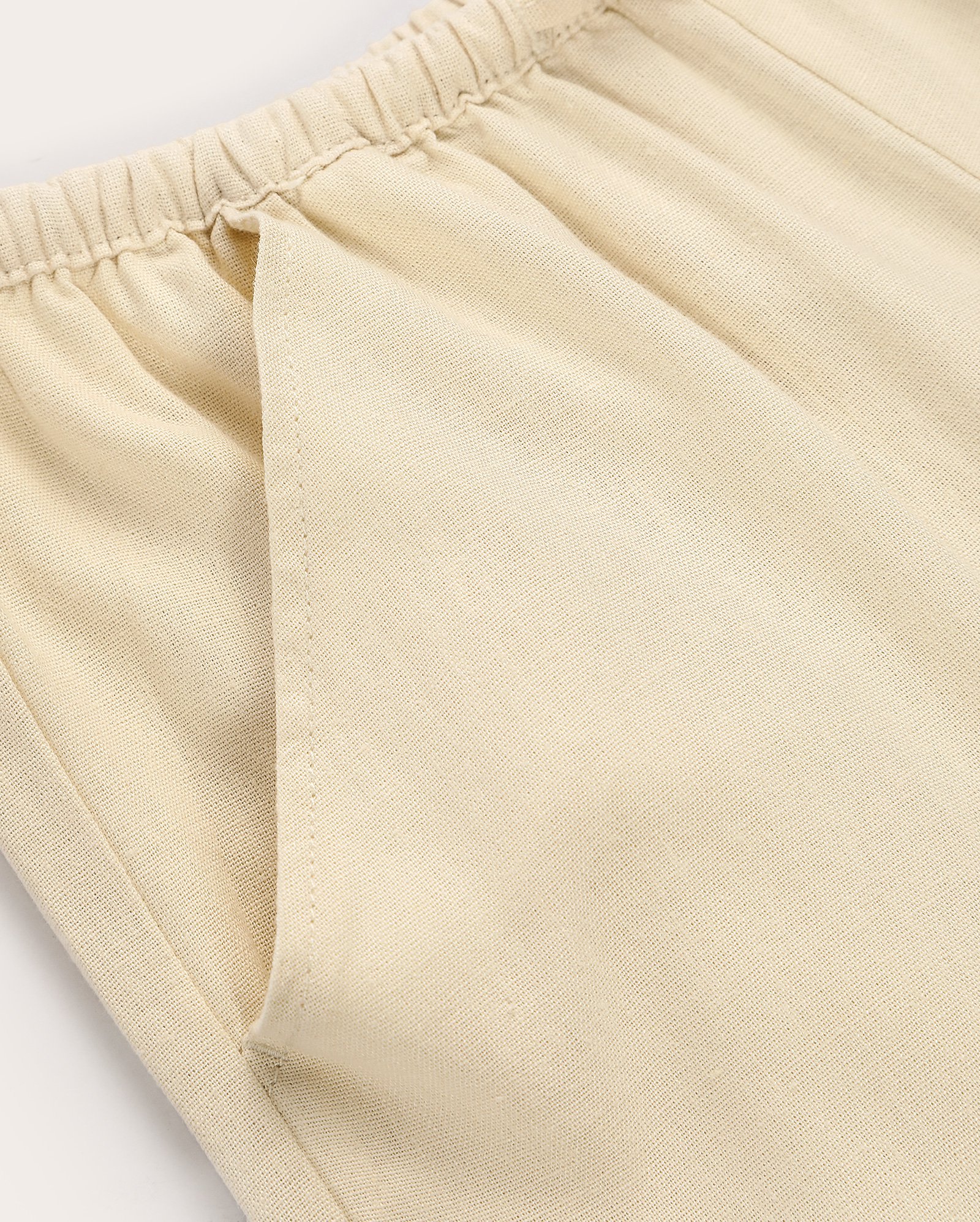 Calça juvenil pantalona em viscolinho com elástico bege