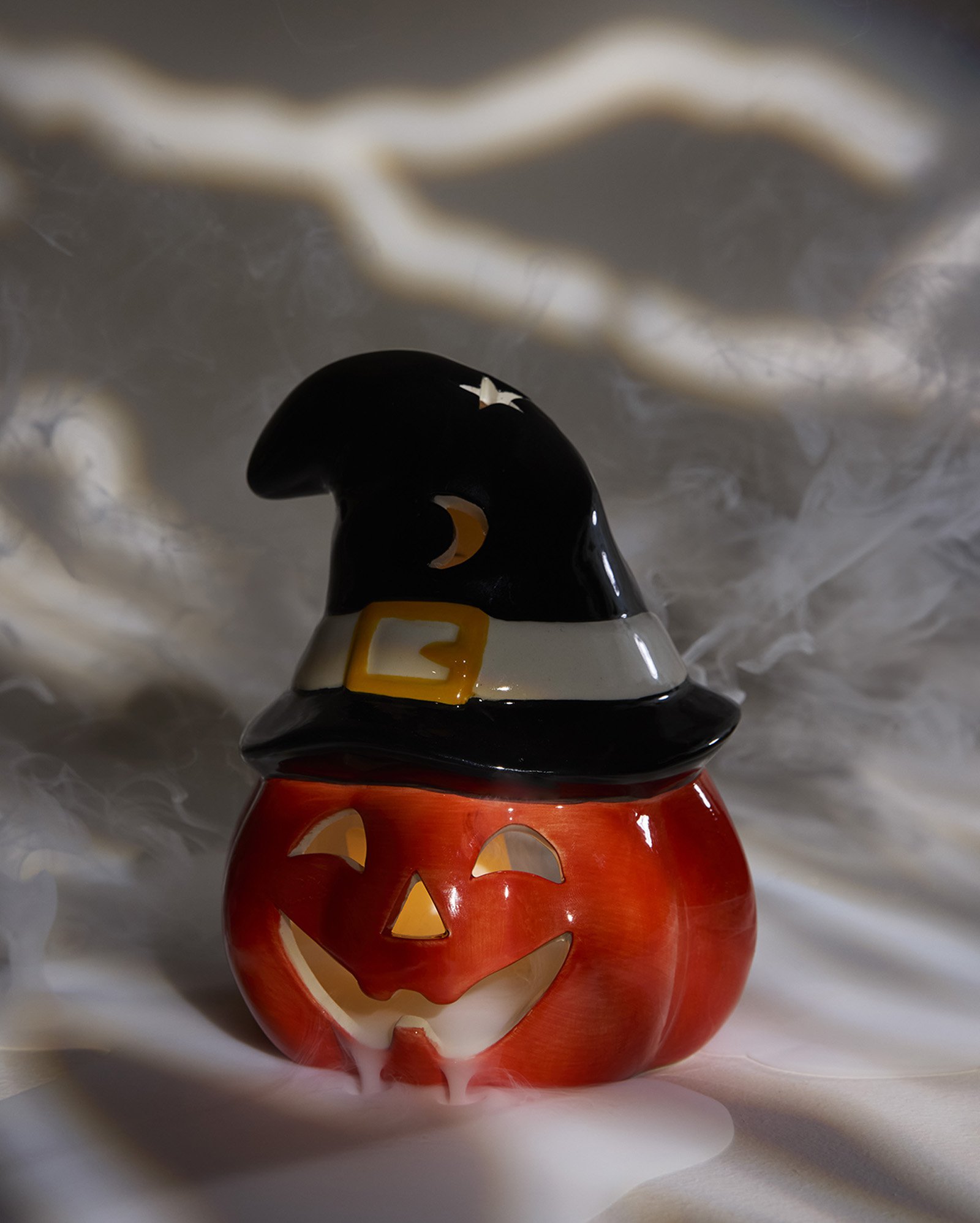 Porta-vela cerâmica Halloween abóbora 15,4cm multicor | Casa Riachuelo