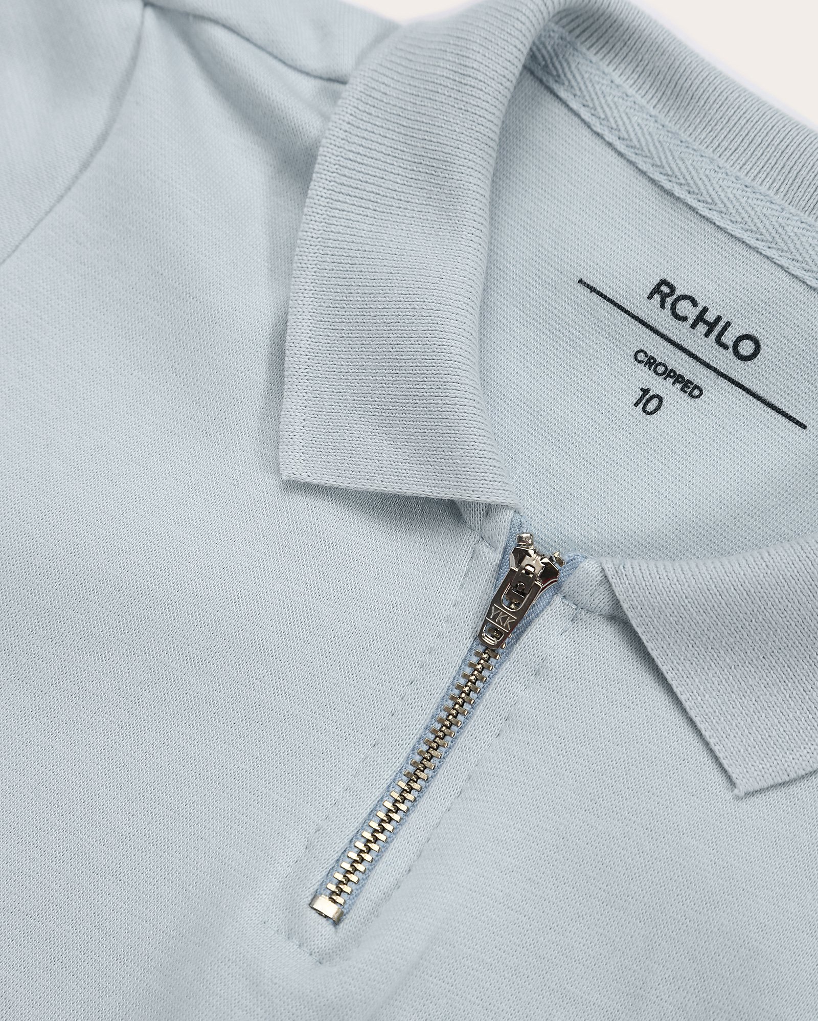 Camisa polo cropped juvenil com zíper e ripple azul | Pool