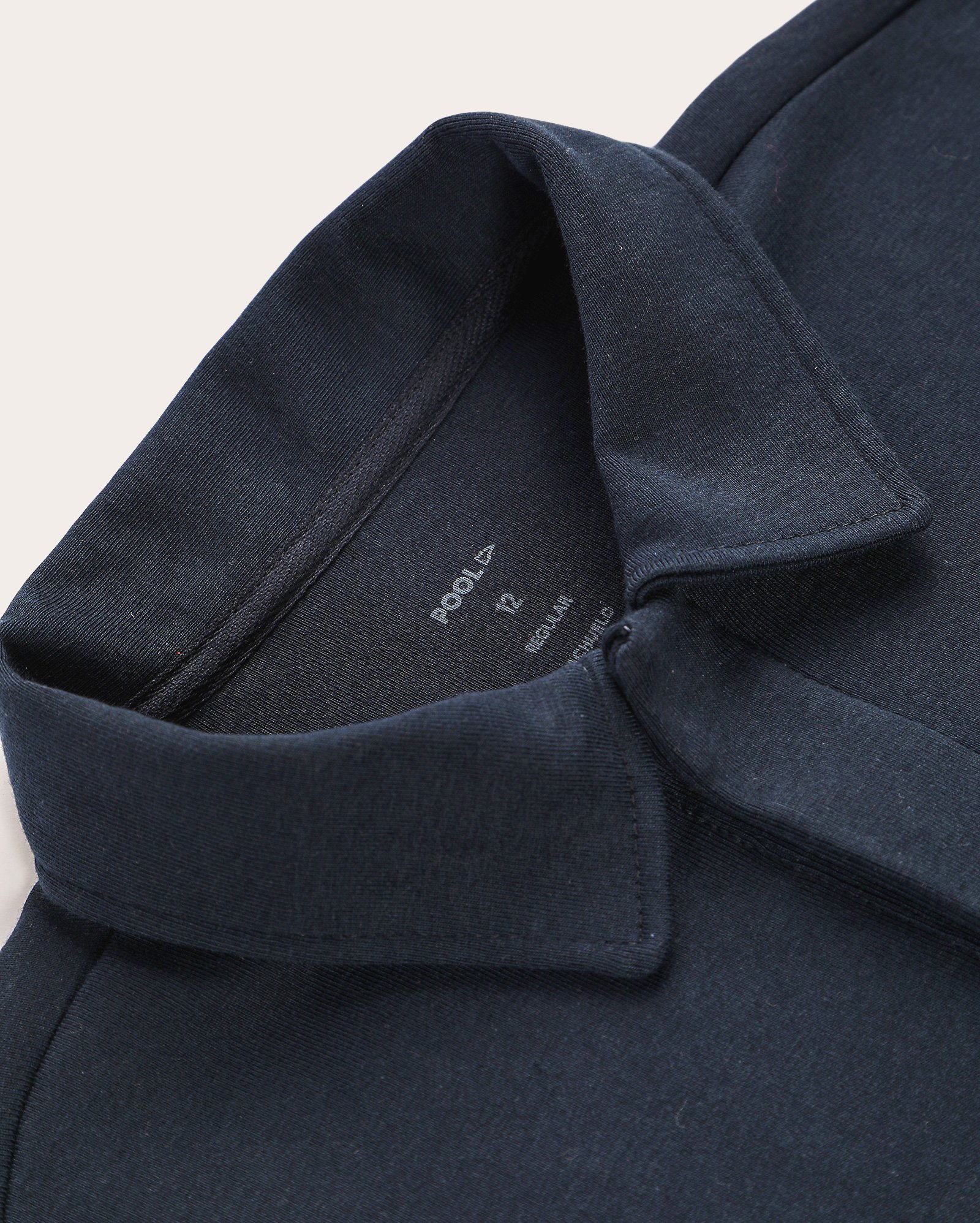 Camisa polo juvenil regular lisa azul