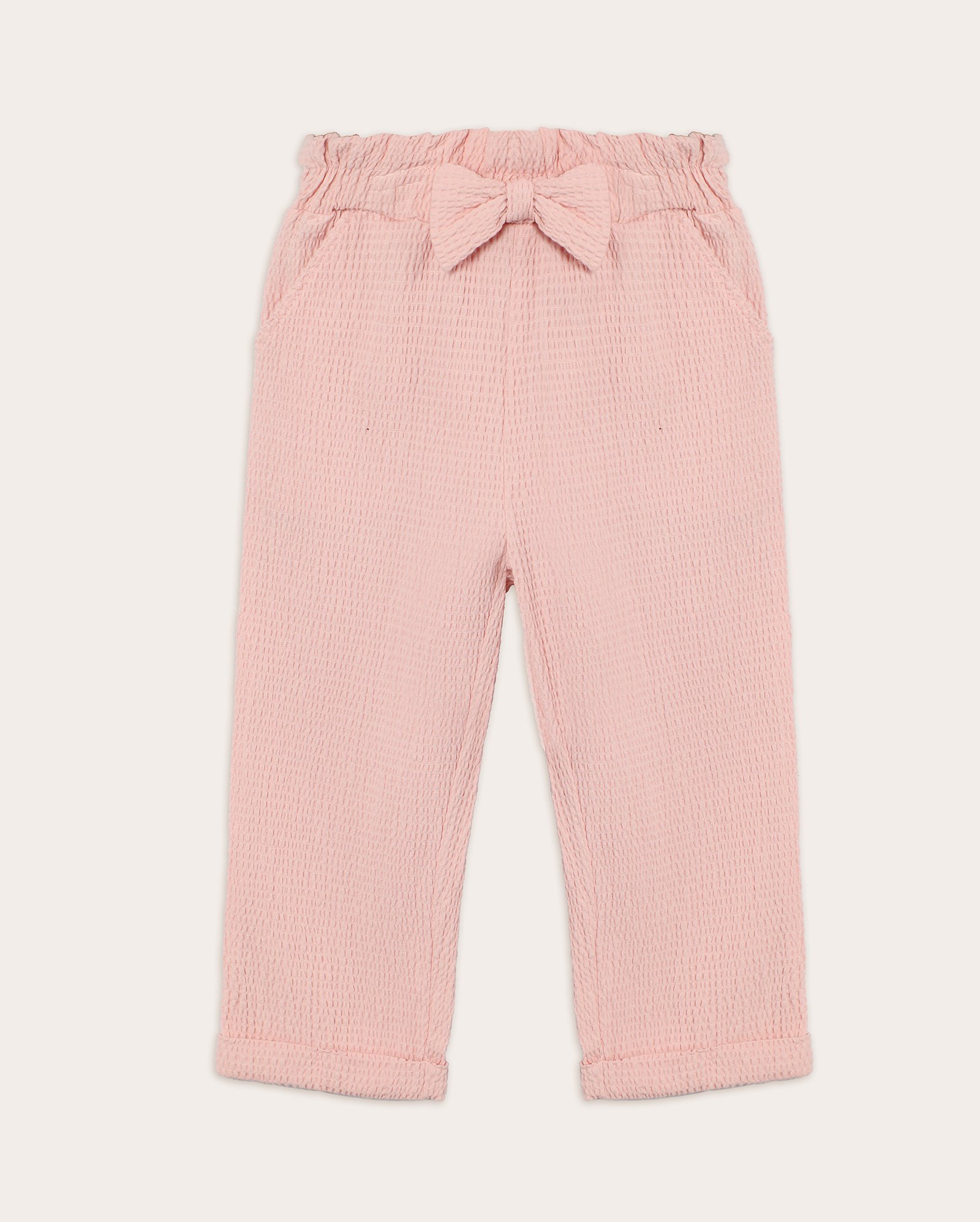 Calça baggy bebê texturizada com laço e cós de elástico rosa