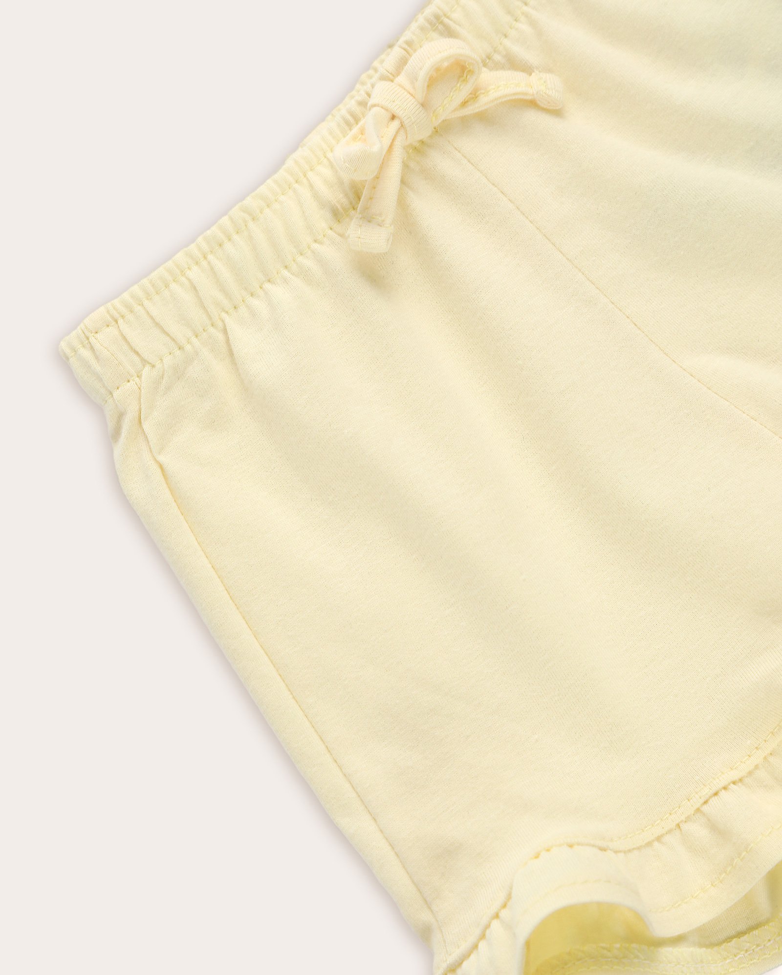 Short bebê em malha com babados amarelo