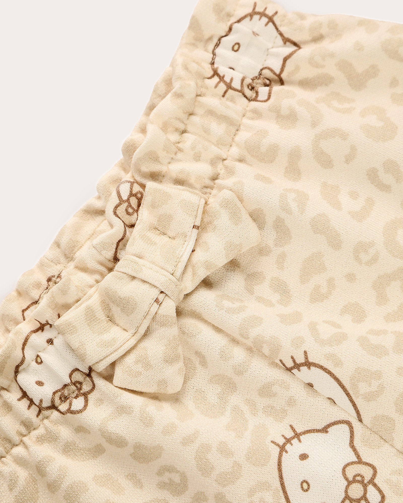 Short infantil clochard em malha Hello Kitty 4-10A bege | Sanrio