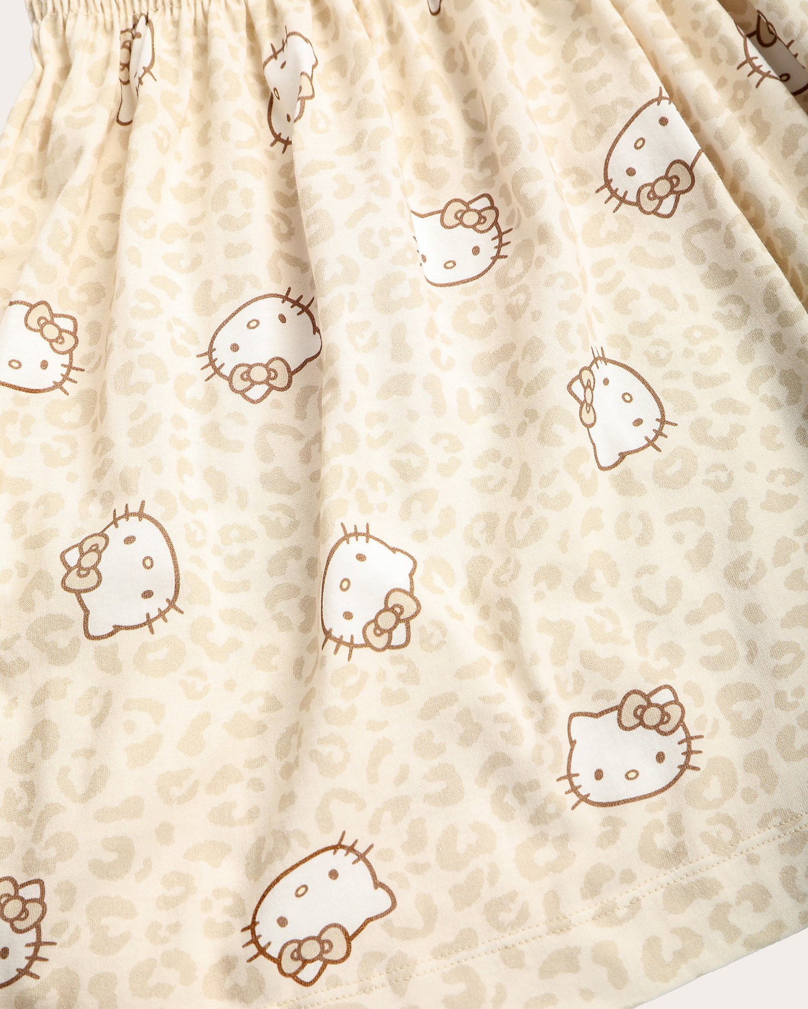 Vestido infantil evasê Hello Kitty 4-10A bege | Sanrio