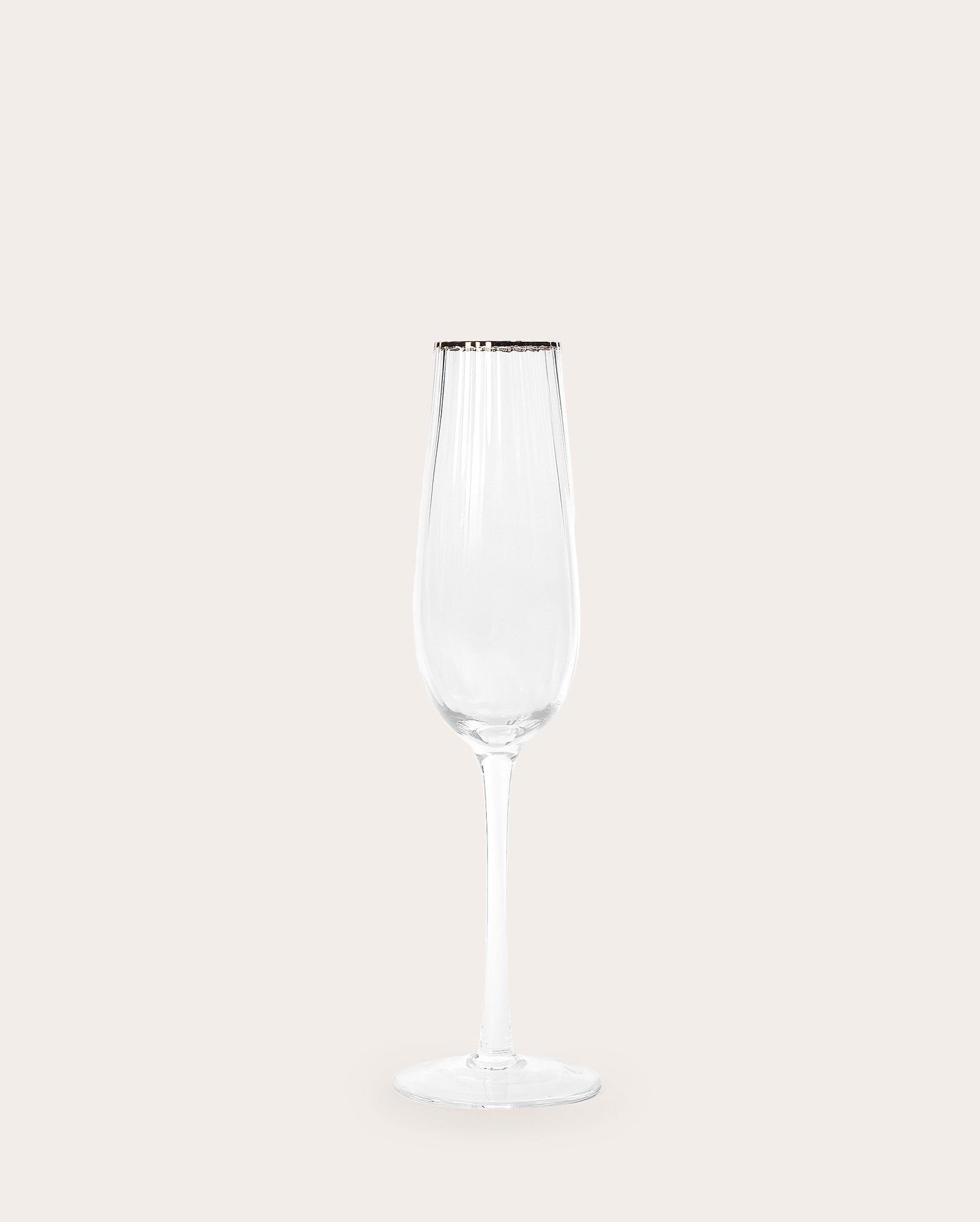Taça de champagne Sara em vidro com detalhe metálico | Casa Riachuelo