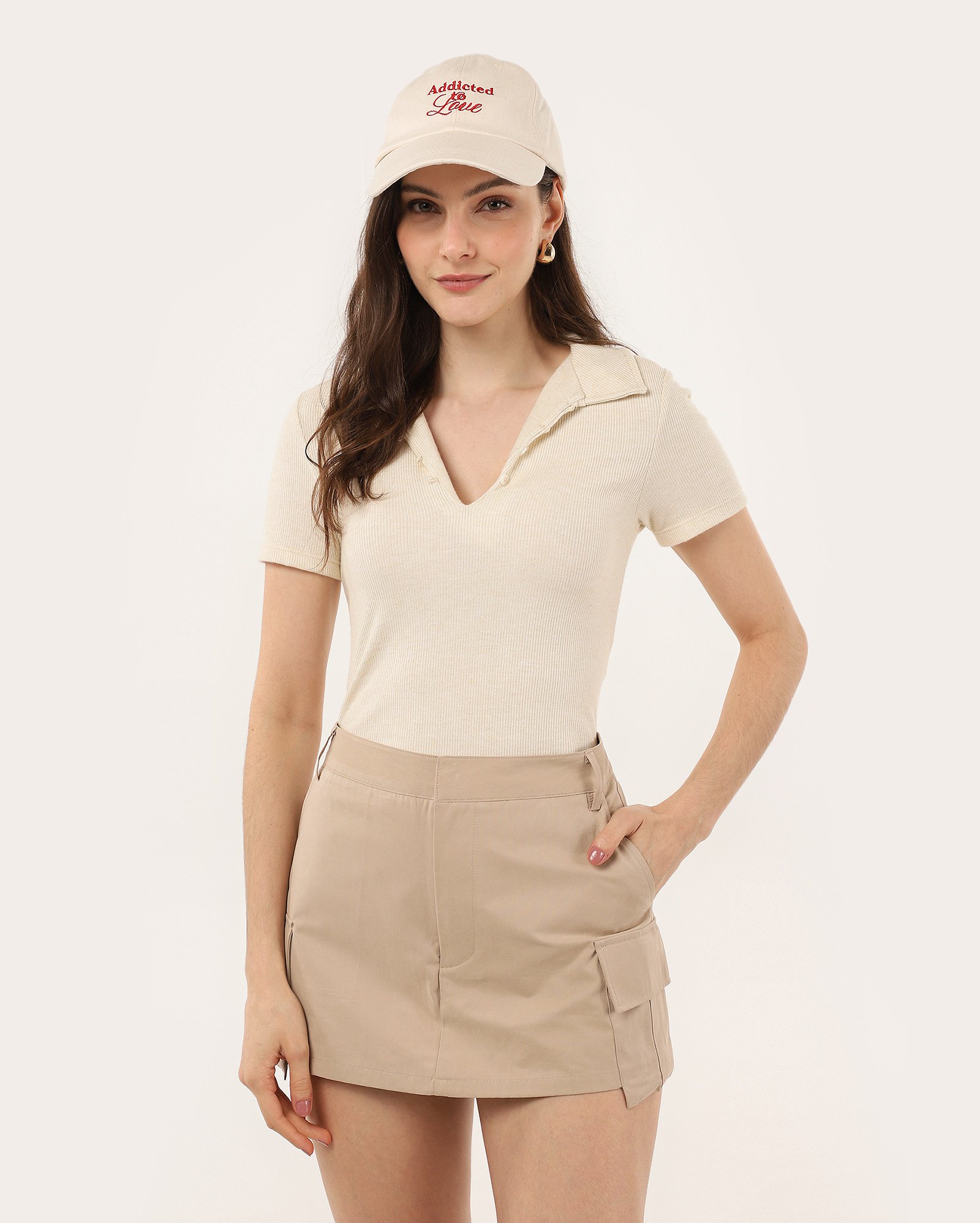 Camisa polo feminina em tricot canelado bege | Pool