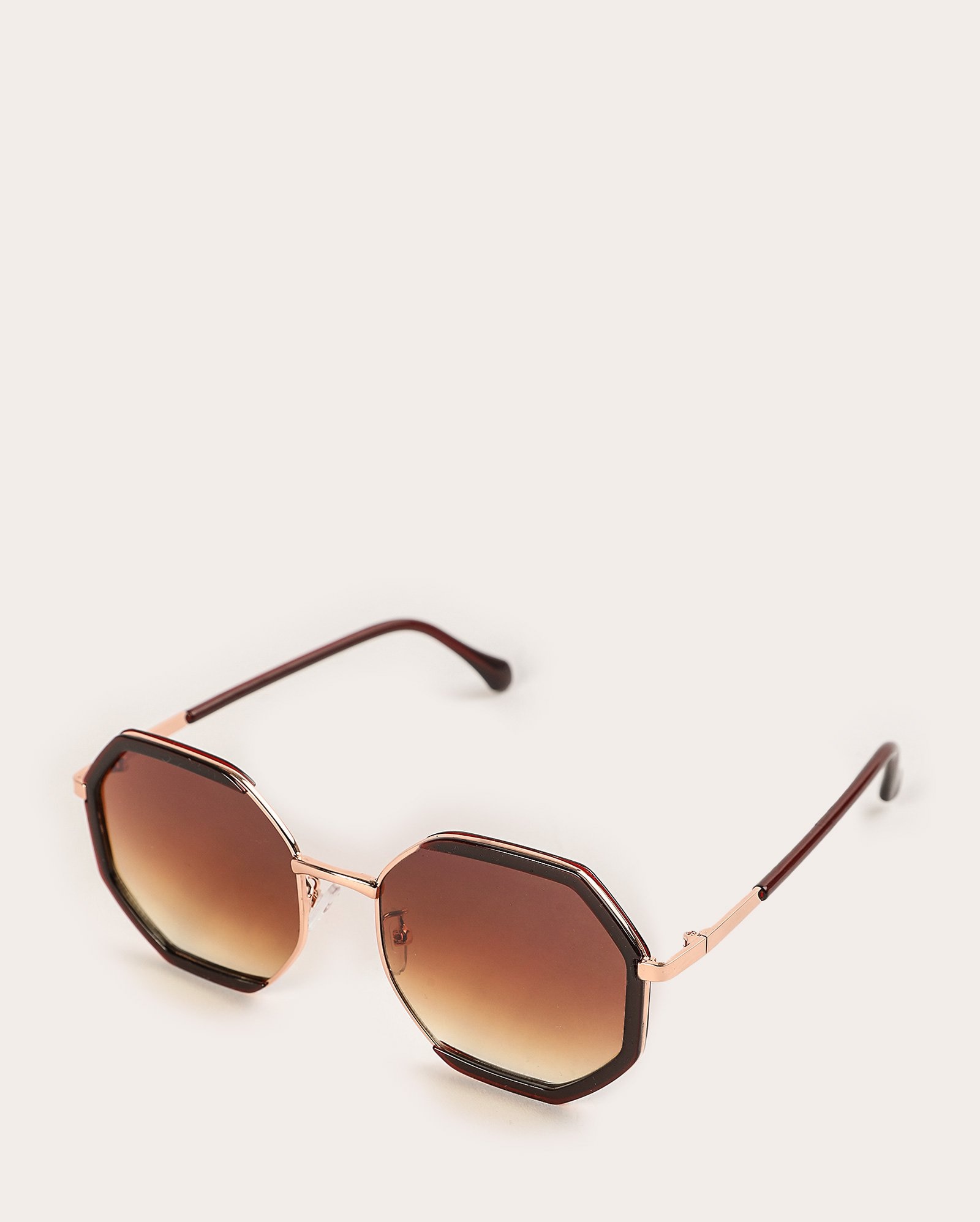 Óculos de sol feminino hexagonal em metal marrom | Riachuelo