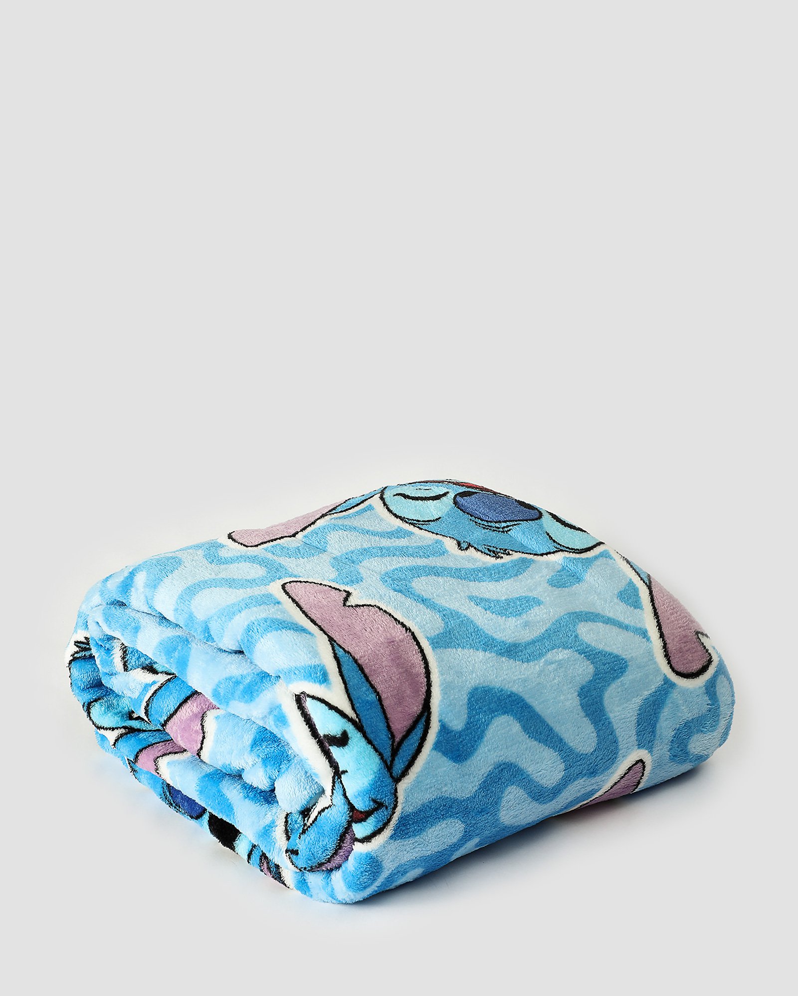 Manta solteiro flannel microfibra caretas Stitch azul | Casa Riachuelo