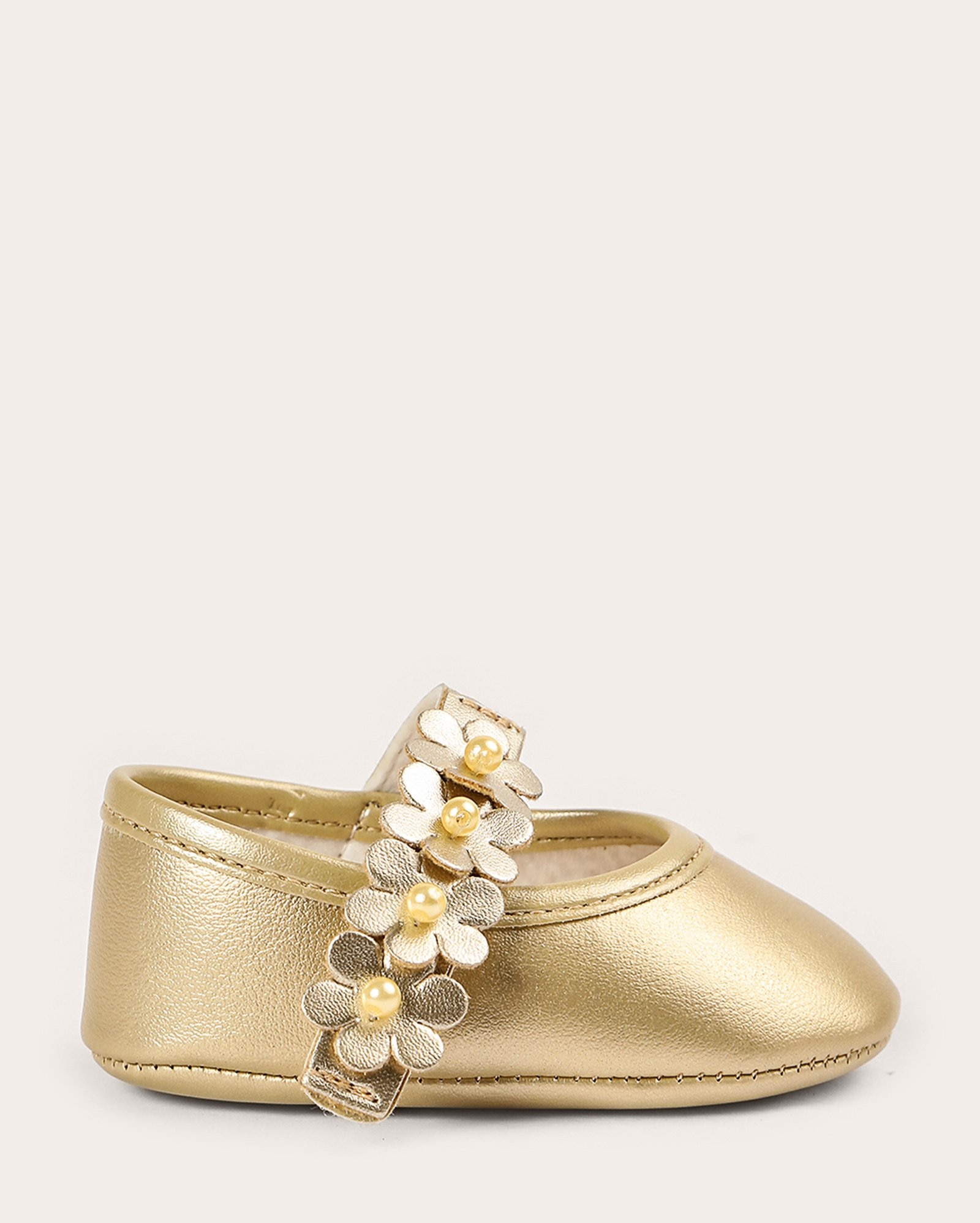 Sapato bebê com flores metalizado dourado