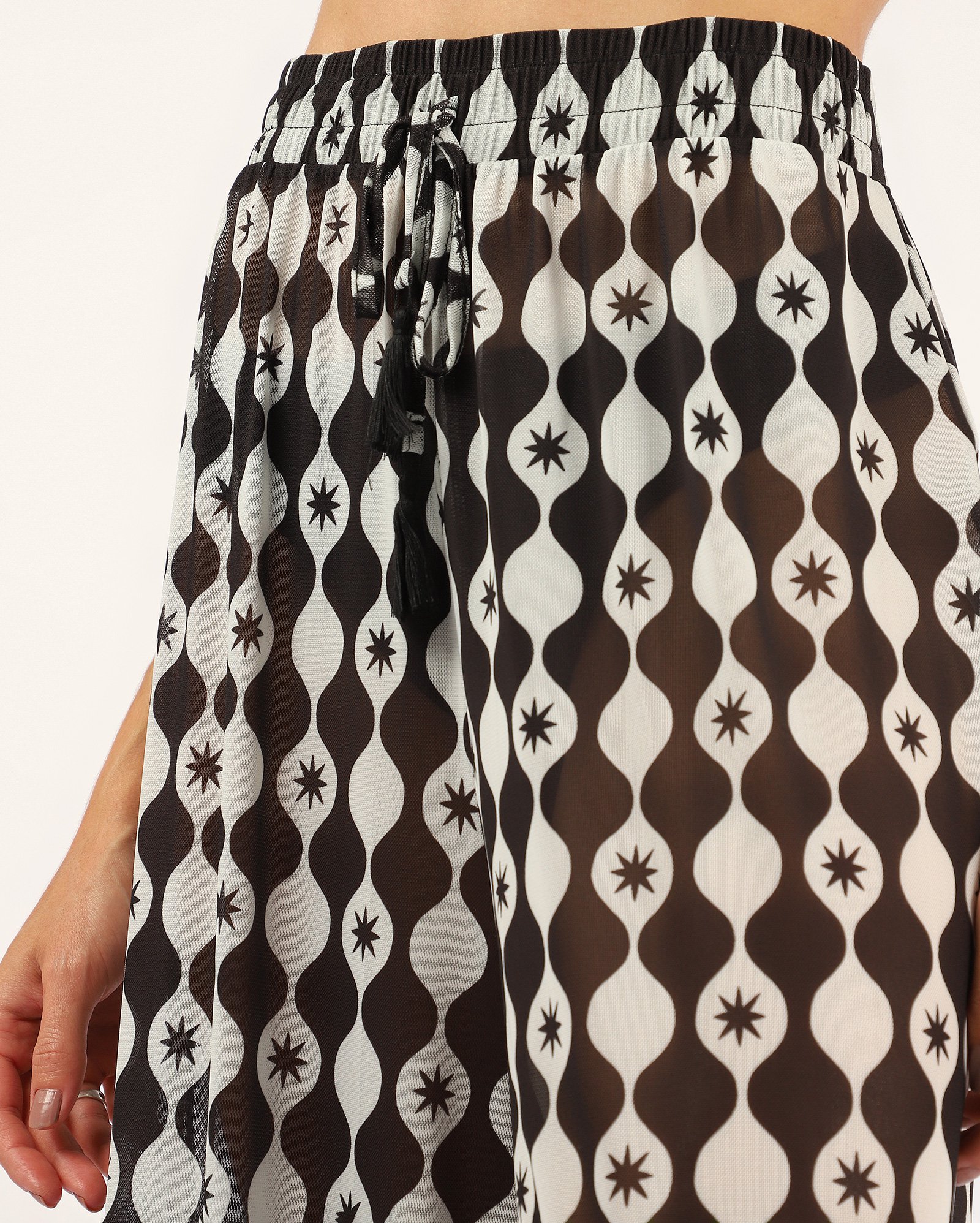 Saída de praia calça em tule estampada - preta