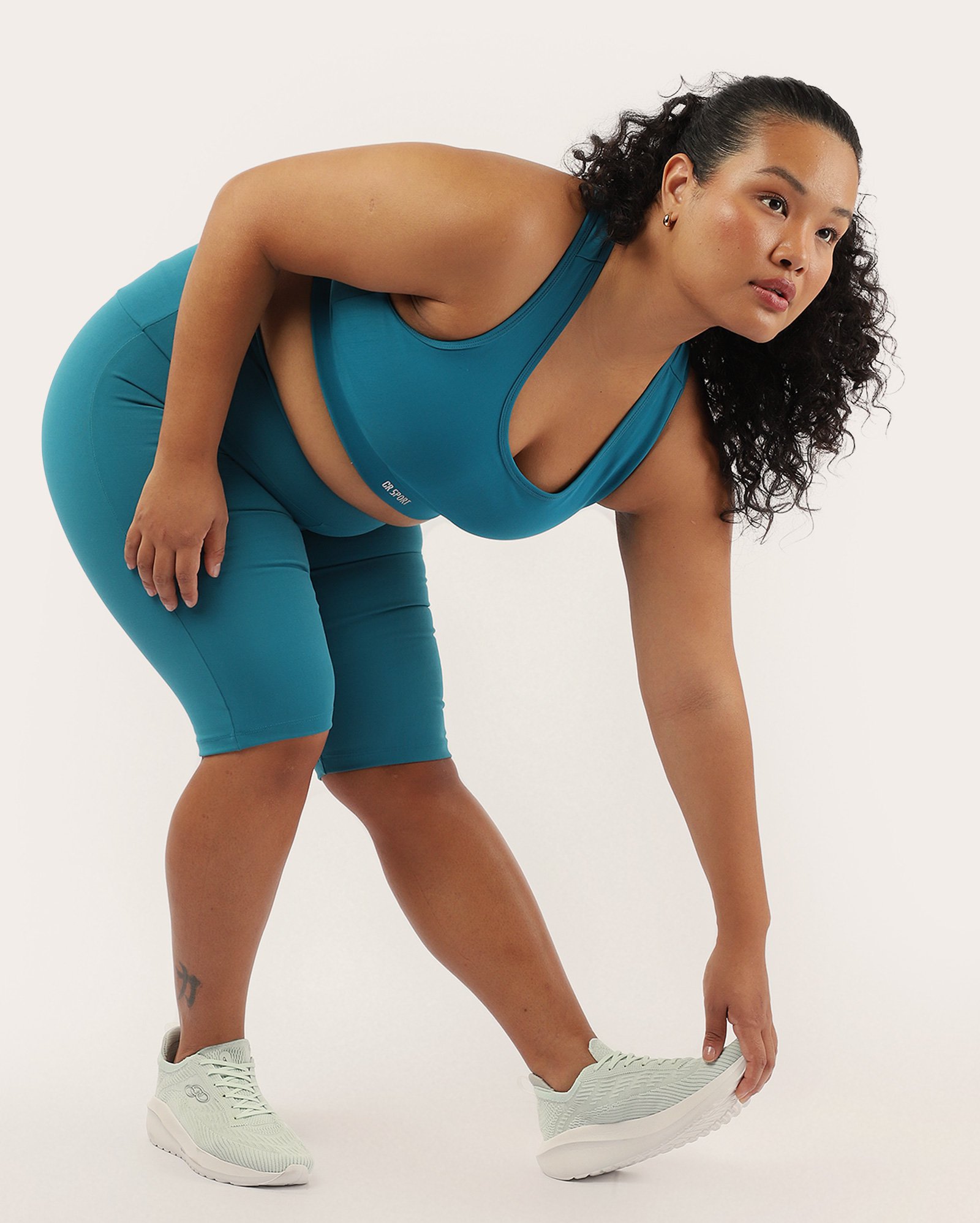 Bermuda esportiva feminina plus size com cós alto - Azul Turquesa | Costa Rica
