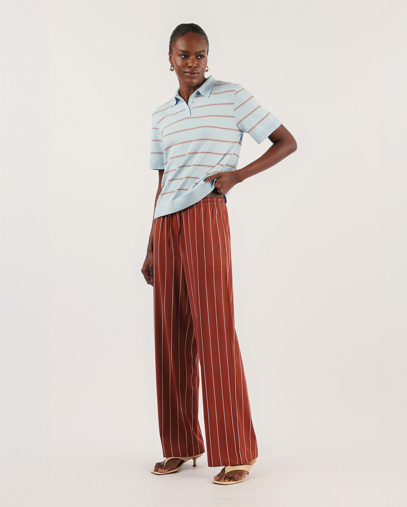 Calça feminina relaxed de viscose com elástico listrada - laranja