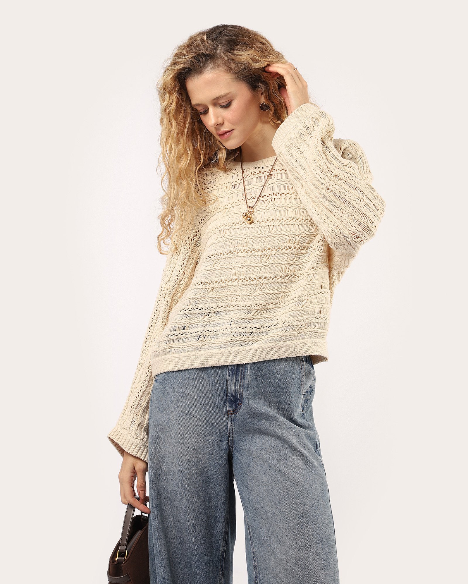 Blusa feminina em tricot texturizada - Bege