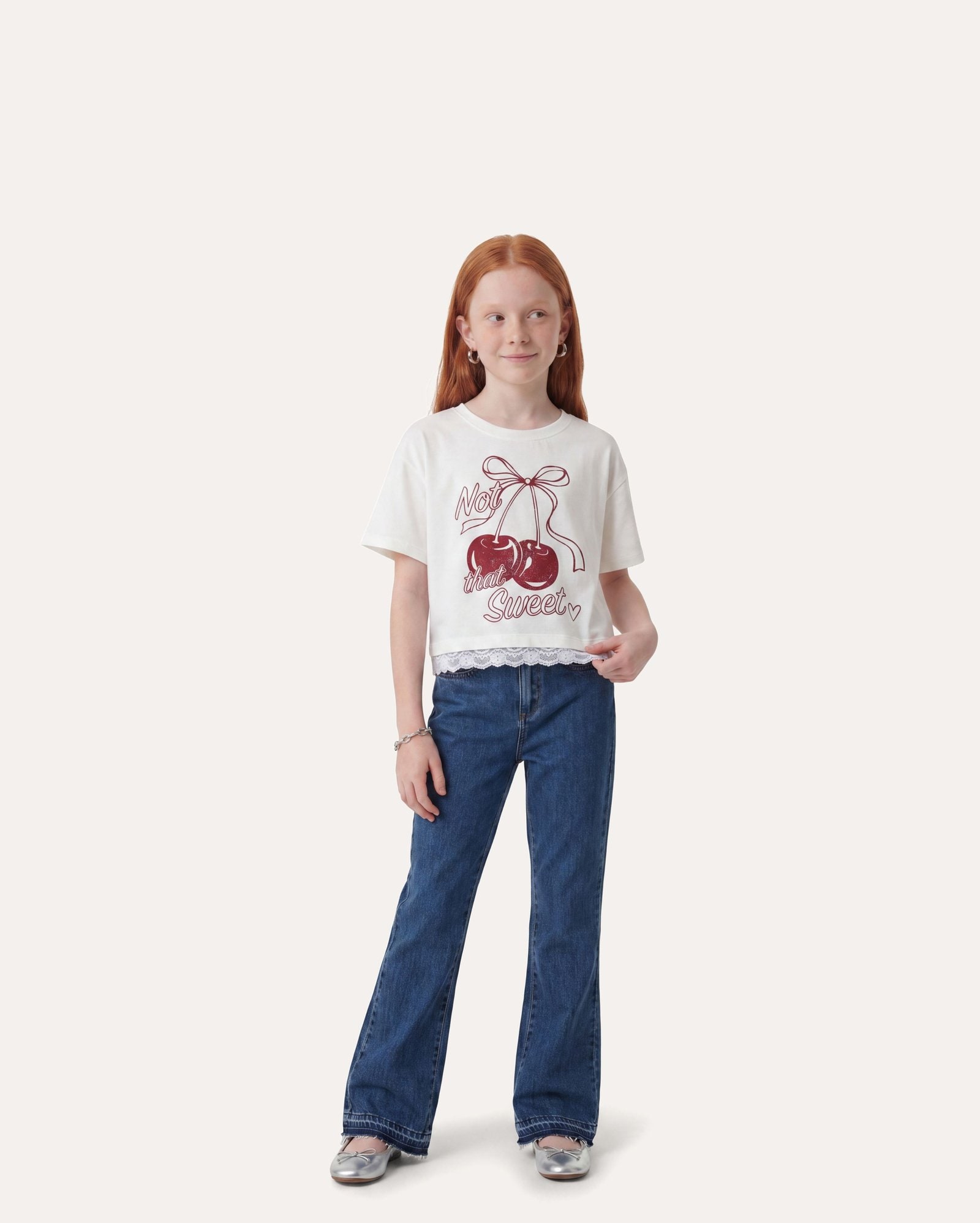 Calça jeans infantil flare com barra desfiada 6-14A - denim médio