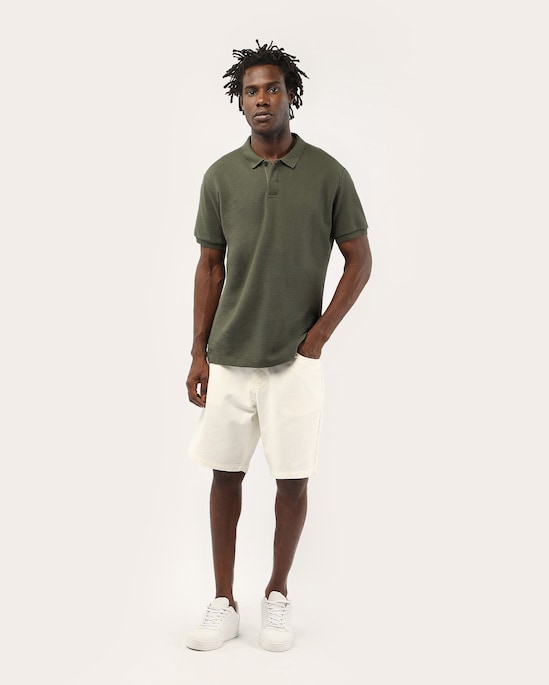 Polo masculina regular texturizada vista coberta - Verde Escuro